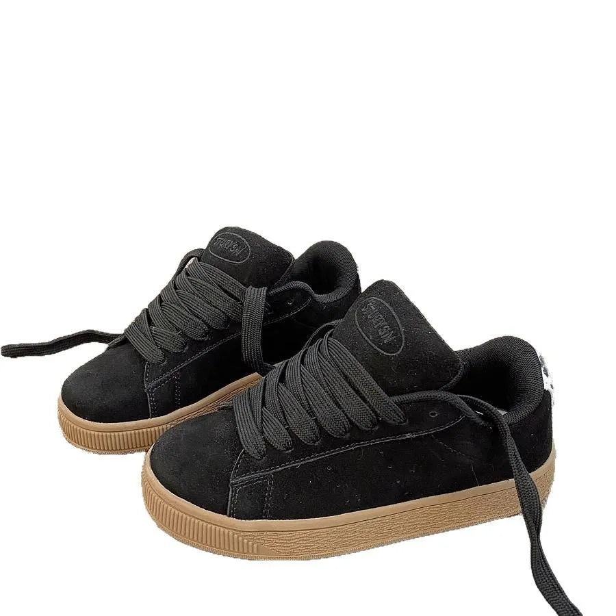 Black retro low-top sneakers with waterproof platform soles and round toe design
