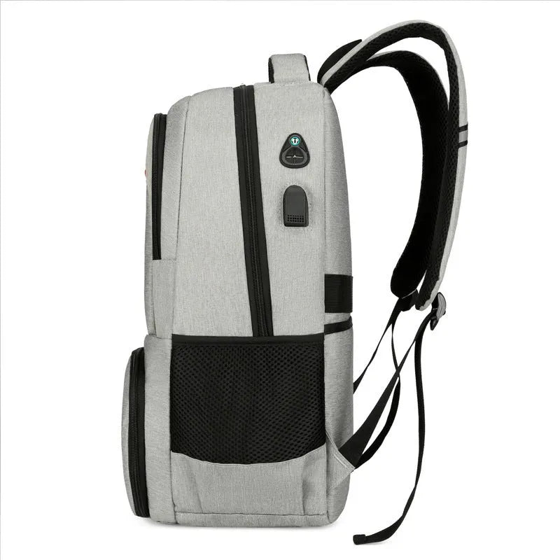 Light grey Oxford cloth insulated backpack with curved shoulder straps, shown with compartments open.