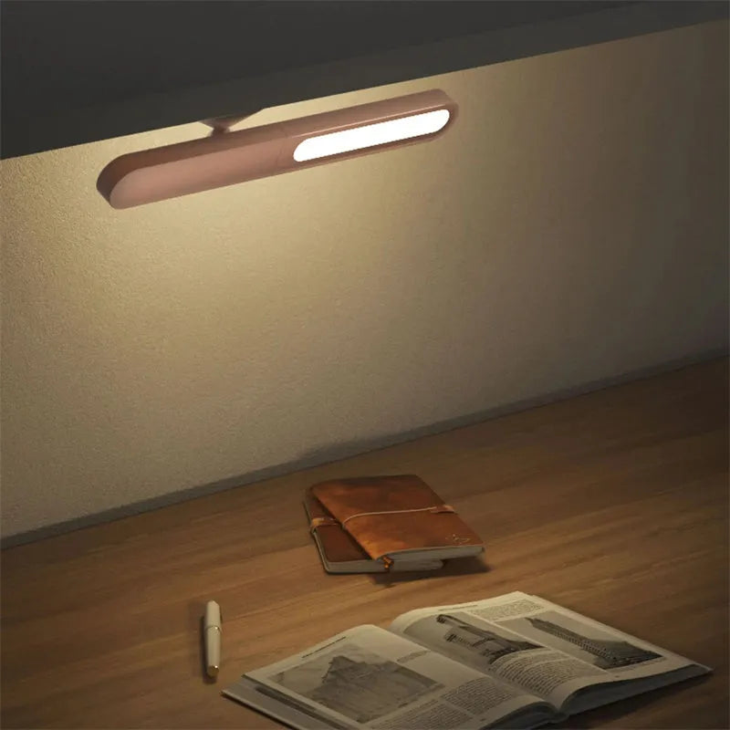 Geometric desk lamp with magnetic suction showing touch switch and USB power connection
