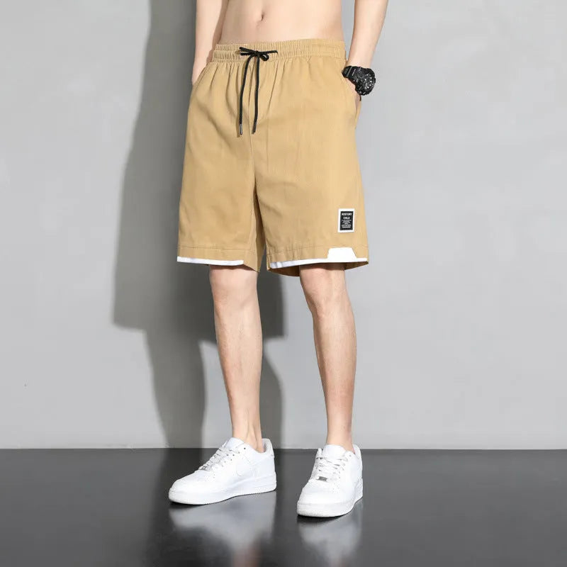 Cotton shorts for boys in plus sizes, shown in black, khaki, and white colour options.