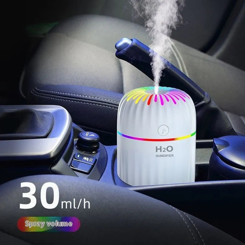 Mini animal-shaped USB humidifier with sterilisation function in green, pink, or white colours