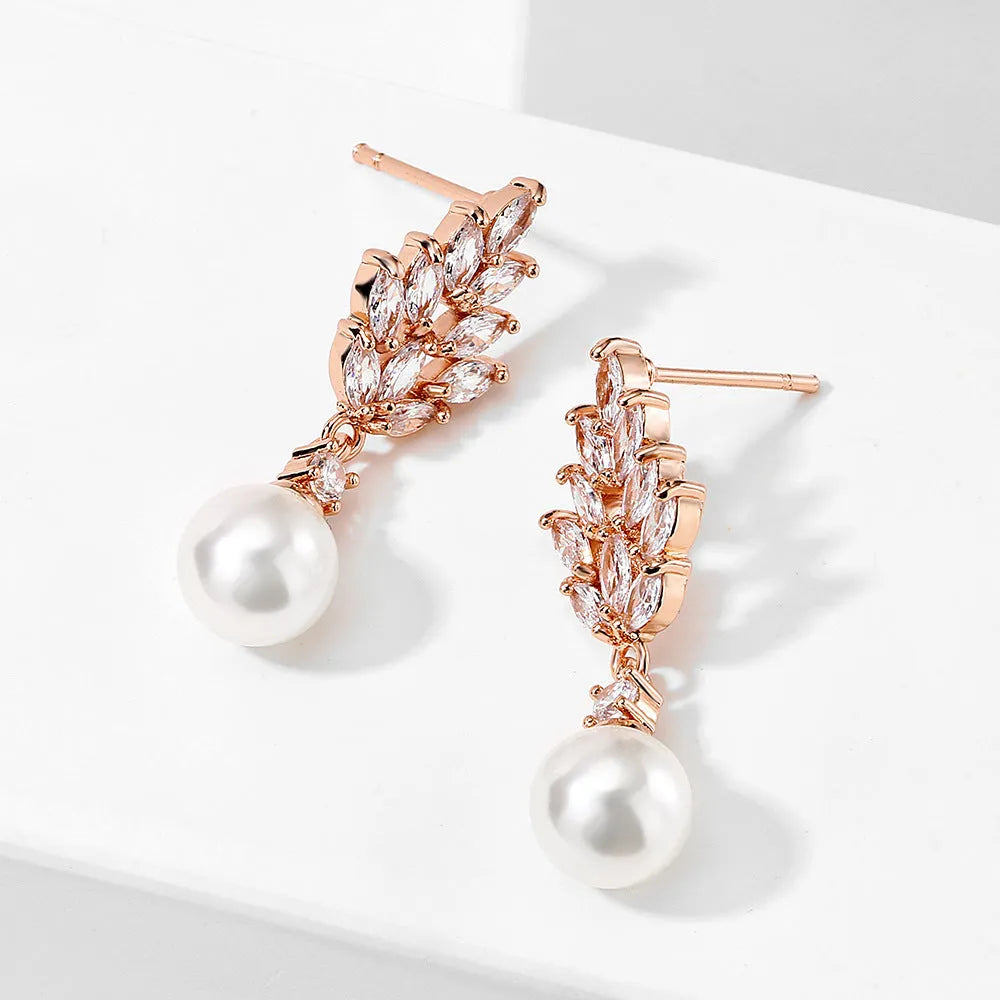 Geometric pearl earrings with micro inlaid zircon and flower design in gold plating