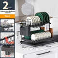 White double-layer removable wire kitchen storage rack with two baskets on a countertop