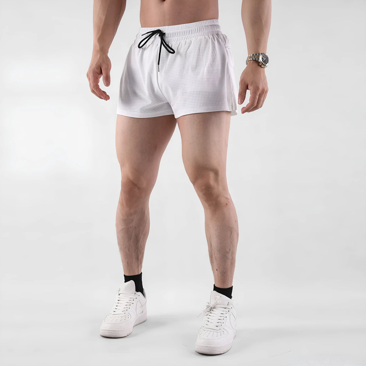 Men's quick-drying nylon summer shorts in black and white colours with mid-waist design