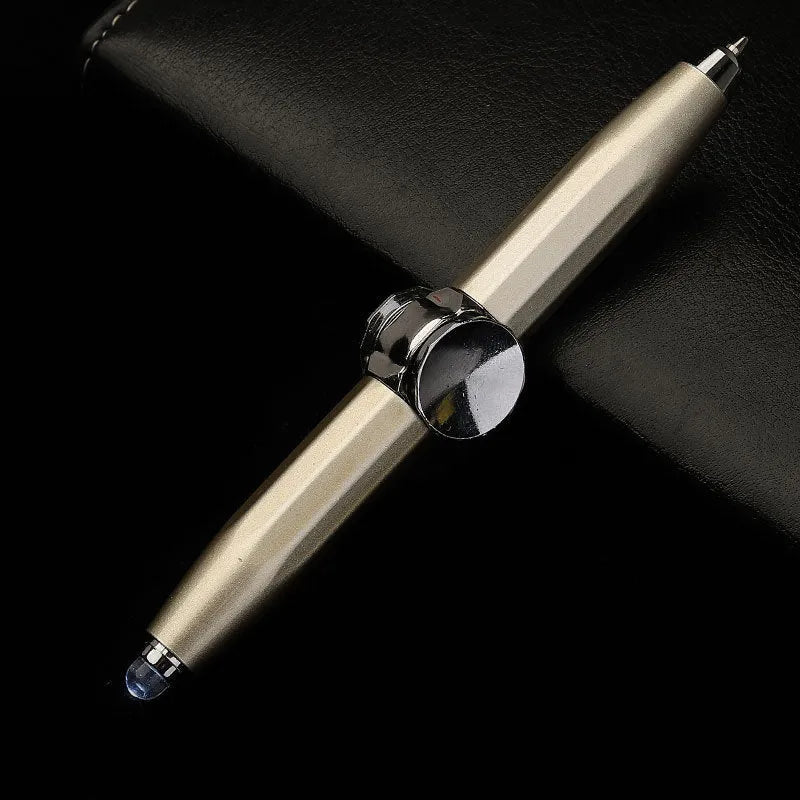 Metal ballpoint pen with integrated LED gyro spinner showing colour-changing lights during spinning