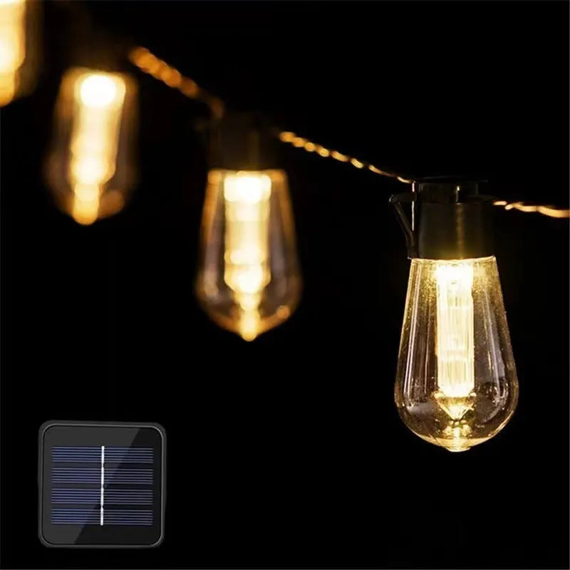 Solar retro outdoor string lights with long bulb infusion bottle shape and IP55 waterproof rating