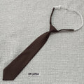Navy blue cotton bow tie with arrow style design showing 35cm length