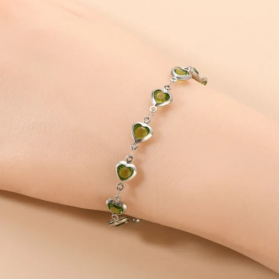 A stainless steel geometric heart bracelet with a Devil's Eye design in one of six electroplated colour options.