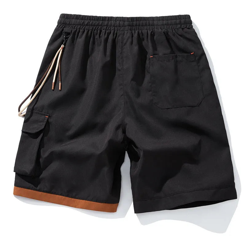 Men's plus size bamboo fibre sports shorts in a loose, cropped straight-leg style on a hanger.