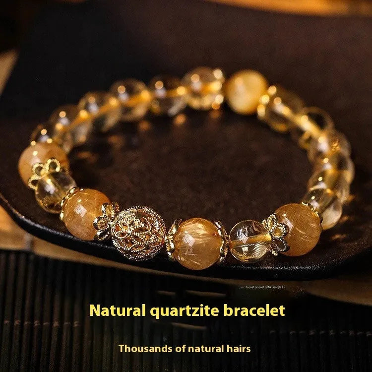 Retro style artificial crystal lucky bracelet for women in amethyst or yellow gold colour with electroplated finish.
