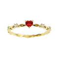 Gold or silver electroplated peach heart fashion ring with zircon stone accents on a copper band.