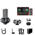 G4 professional USB sound card with LCD display, microphone, remote control and audio cables on a desk