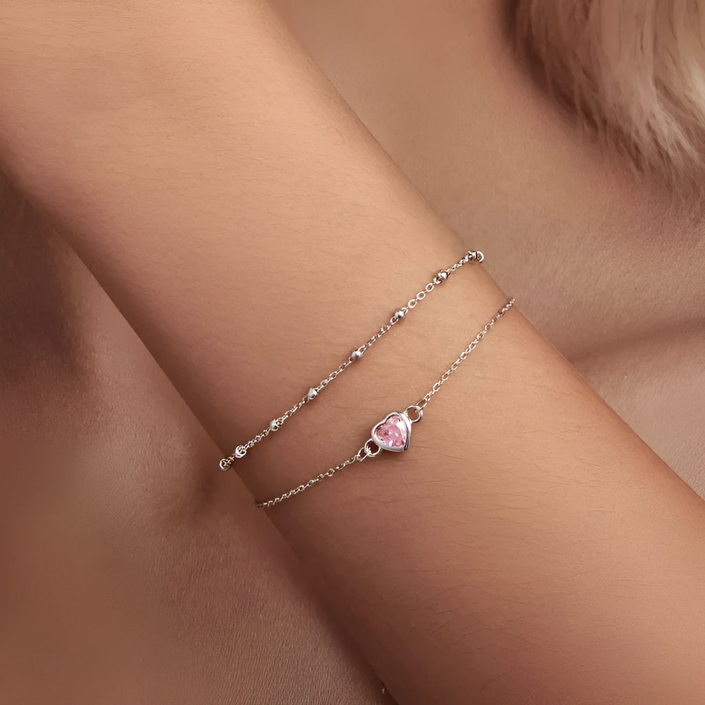 Women's sweet heart-shaped 925 sterling silver bracelet with adjustable chain on wrist