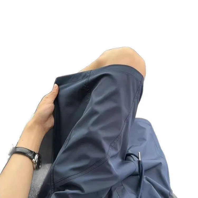 Men's quick-dry sports shorts in beige, black or navy blue with elastic waistband