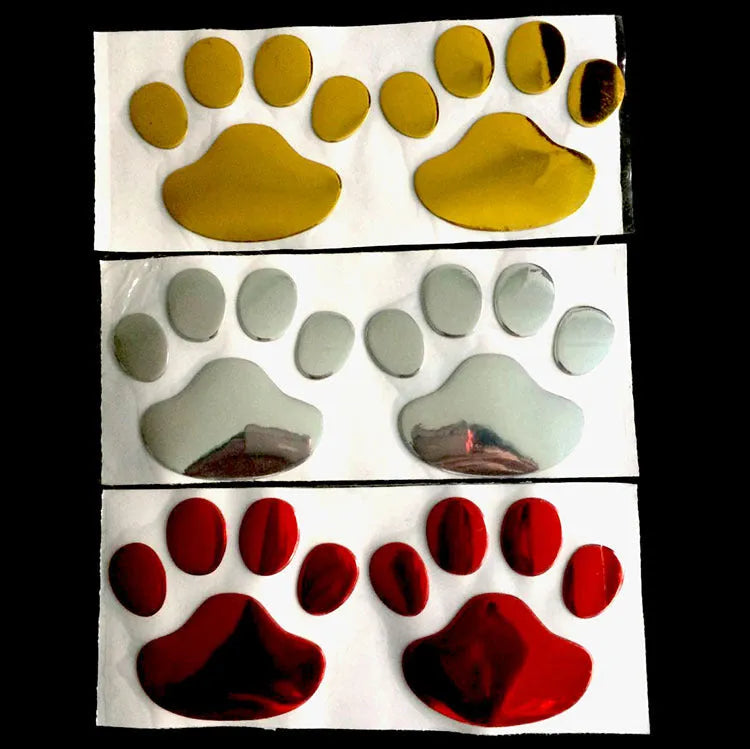 PVC car sticker pair with hand-shaped brush design showing dog footprints in multiple colour options
