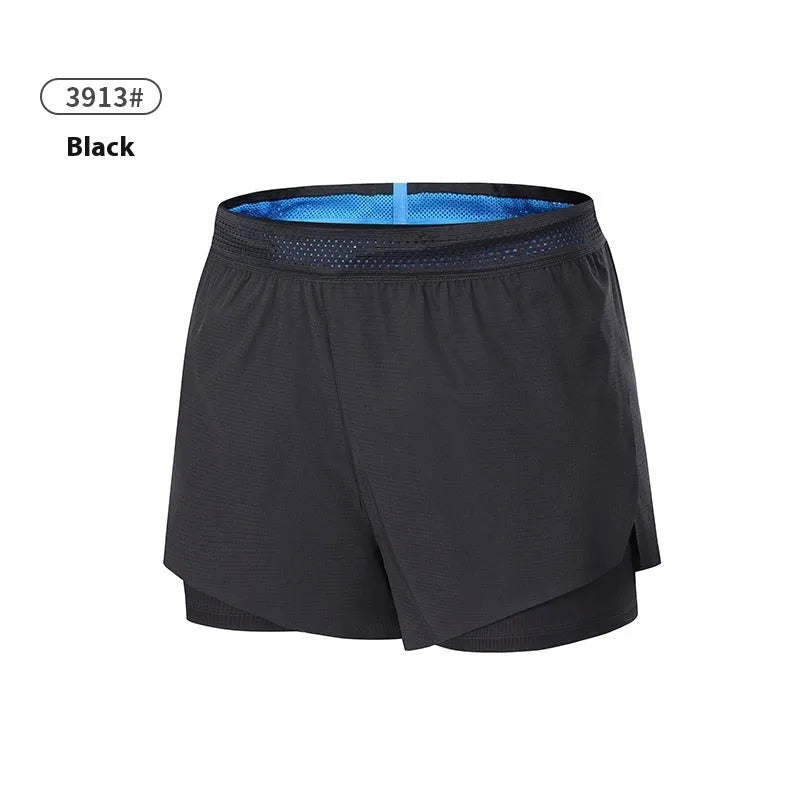Men's black polyester basketball shorts with low-waist elasticated waistband laid flat