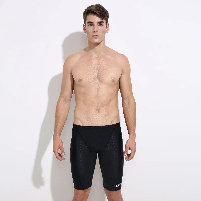 Men's black swimming set with polyester trunks, anti-fog goggles, waterproof cap and accessories