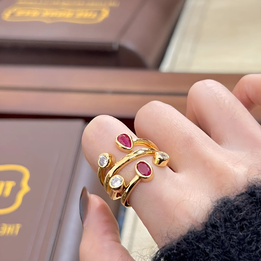 Geometric irregular cross diamond ring in two-tone colours with double-headed design