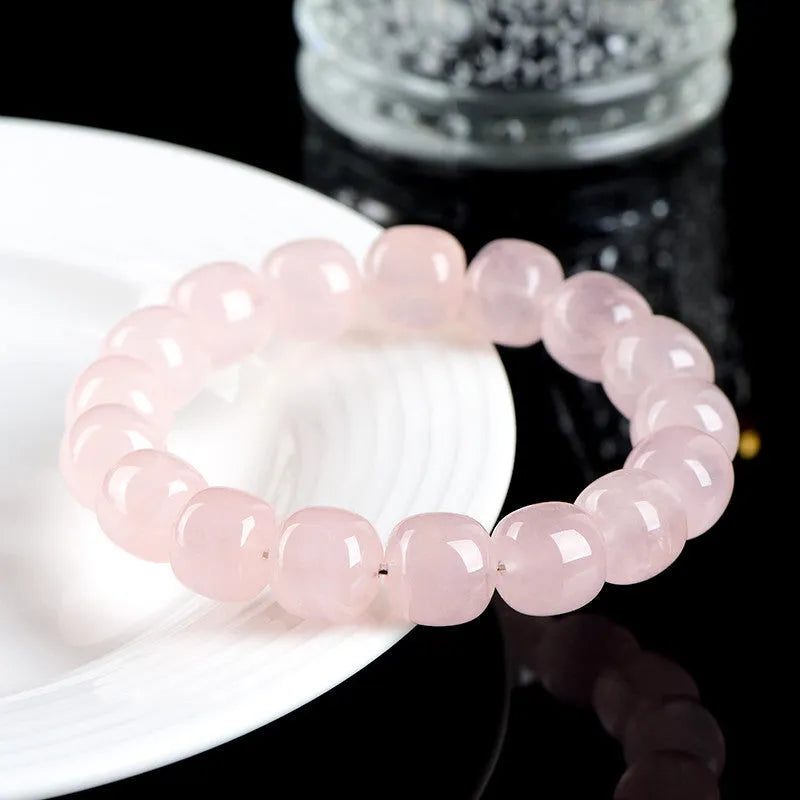 Pink bamboo crystal bracelet with 11mm barrel beads in original geometry design