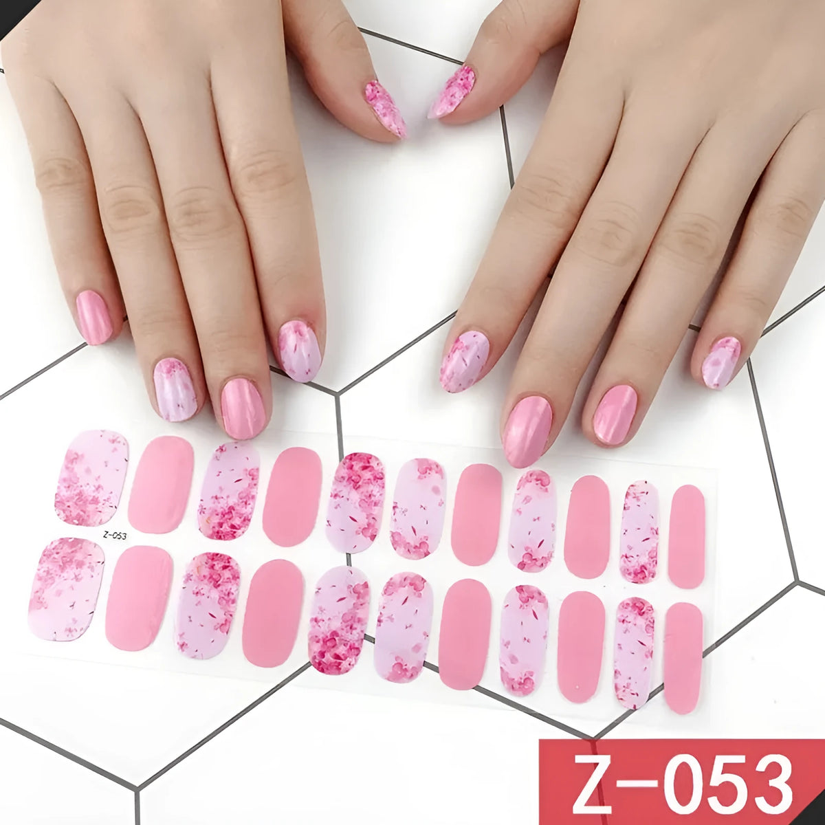 Pack of Korean nail stickers showing cartoon, strawberry, flower, and peach designs with a nail file.