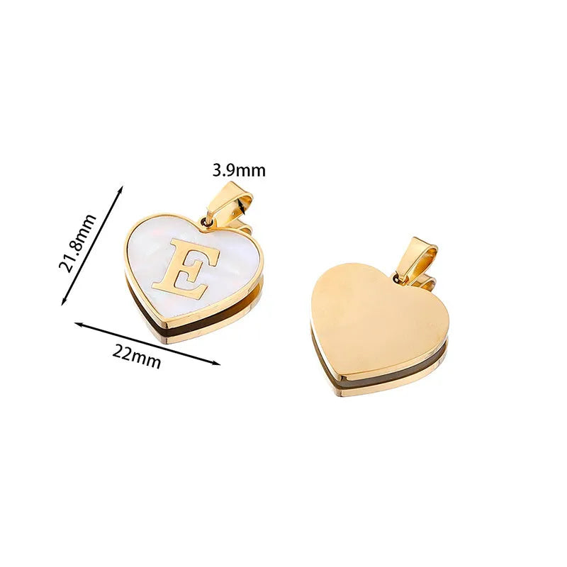 Gold plated initial necklace with white shell heart pendant and adjustable chain