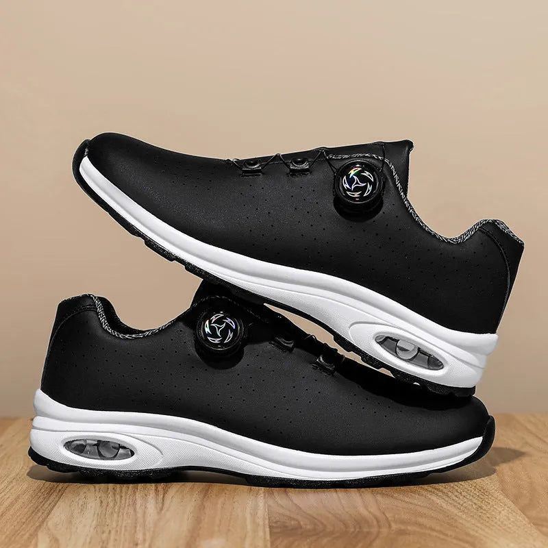 Men's black and white low-top casual tennis shoes with mesh uppers and composite soles