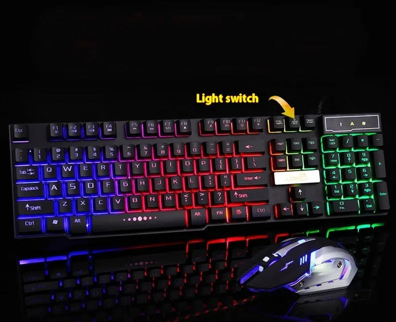 White or black gaming keyboard with glowing LED backlight and USB cable on a desk