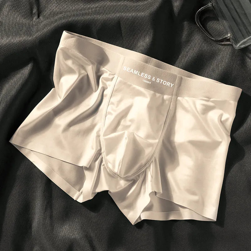 Men's ice silk underwear in mid-waist cut showing coffee, light grey, white, and blue colour options on a solid background.