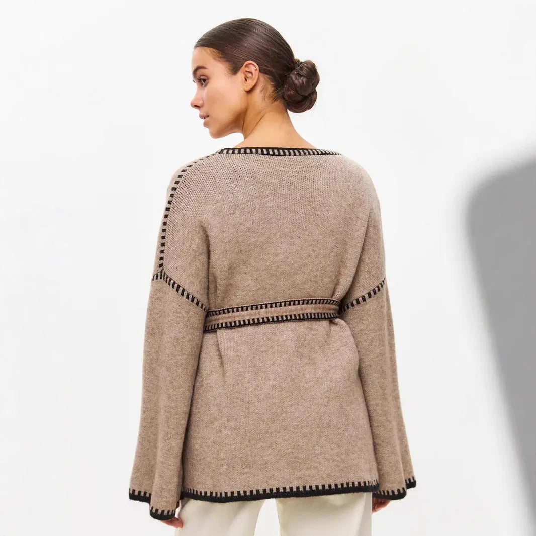 Loose fit knitted cardigan with lace-up front detail in thick imitation cashmere cotton fabric.
