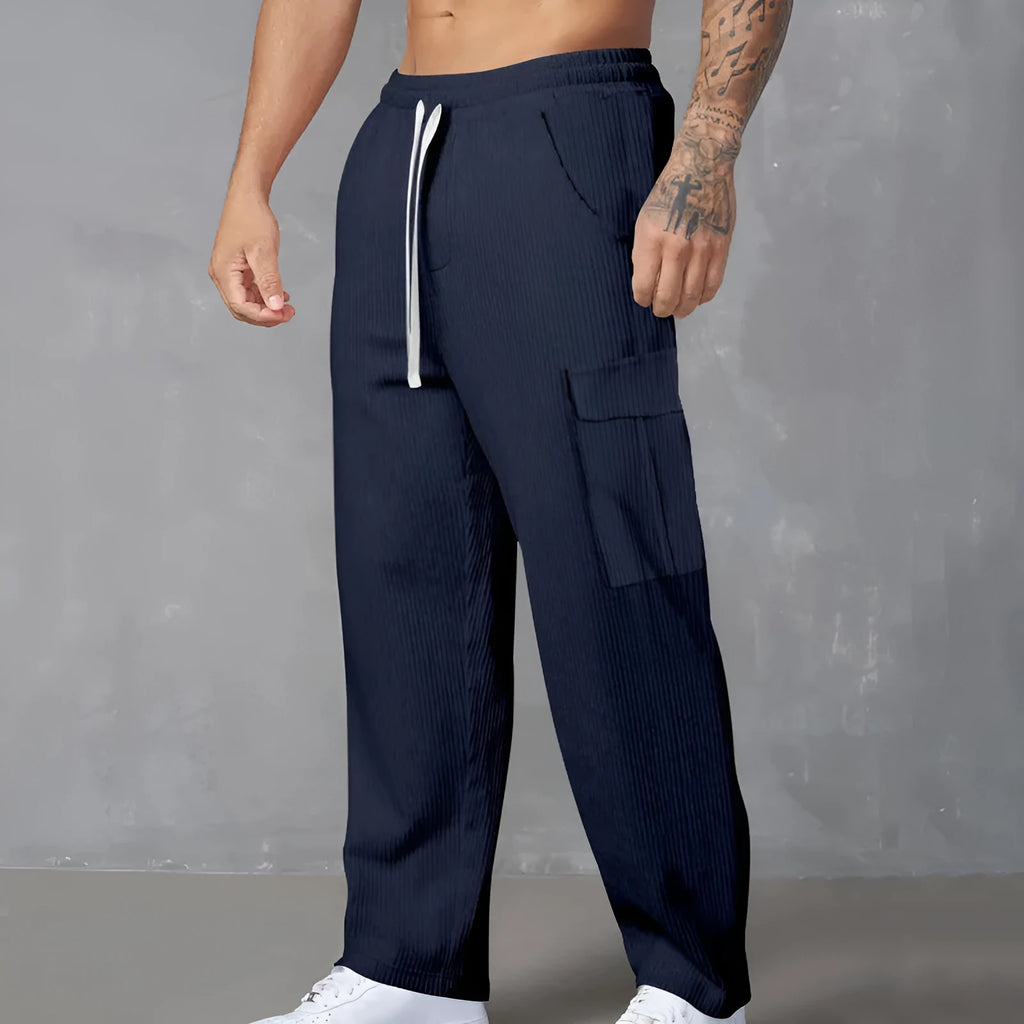 Men's loose-fitting corduroy cargo trousers in a straight-leg design with a drawstring waist.