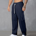 Men's loose-fitting corduroy cargo trousers in a straight-leg design with a drawstring waist.