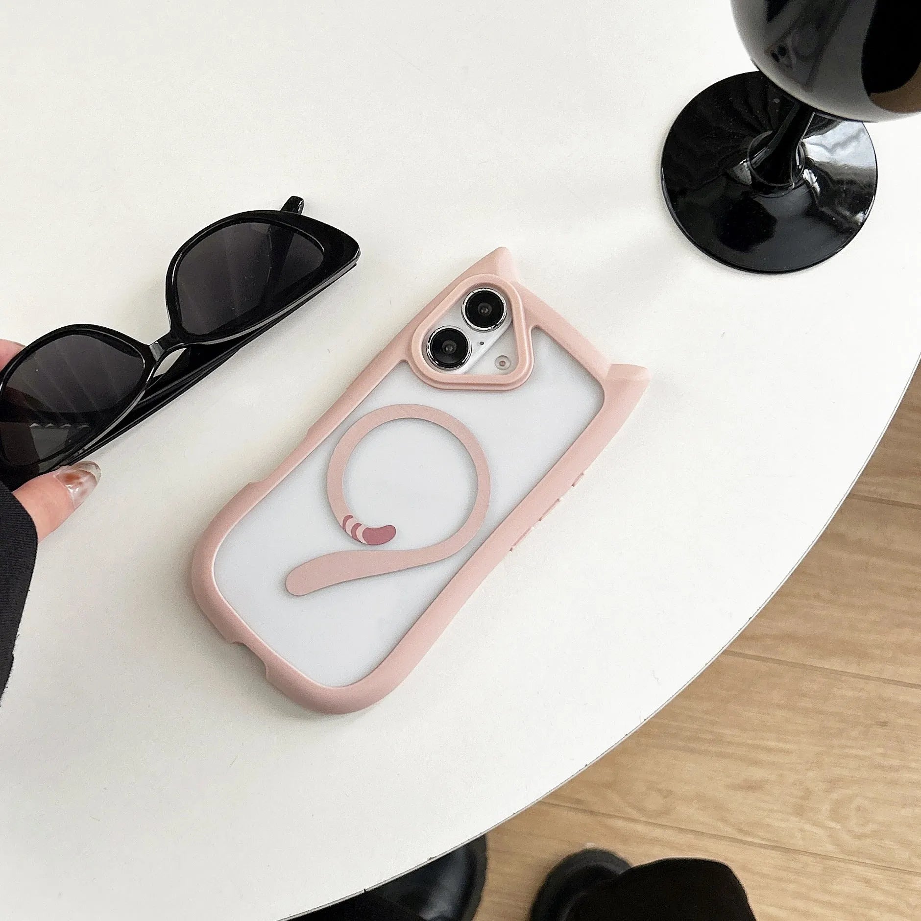Transparent acrylic TPU iPhone 17 phone case showing magnetic suction compatibility and clear design
