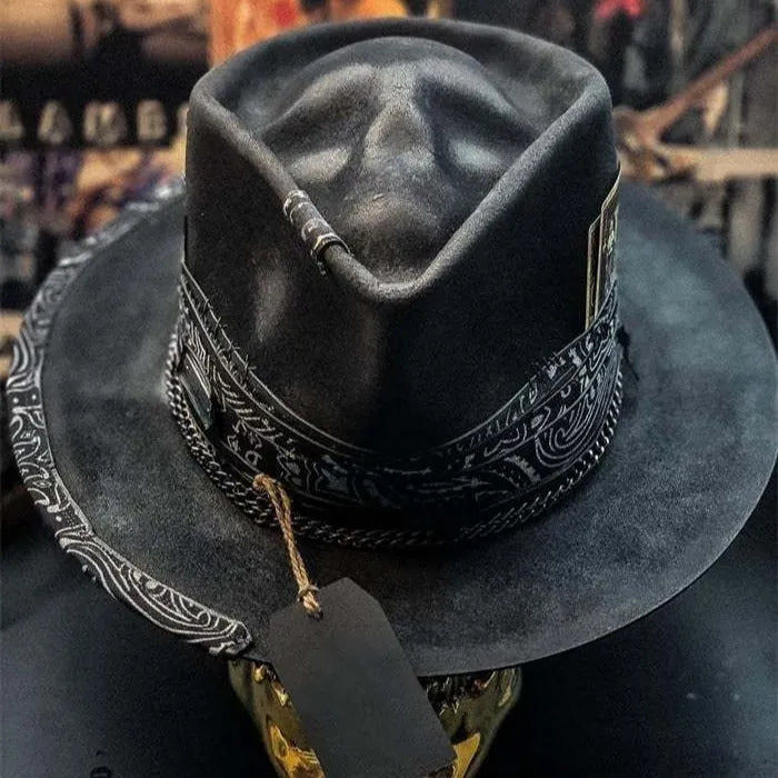 Handmade wool felt conical hat with skull design and denim-style crown