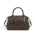 Genuine leather street style handbag for women with adjustable shoulder strap.