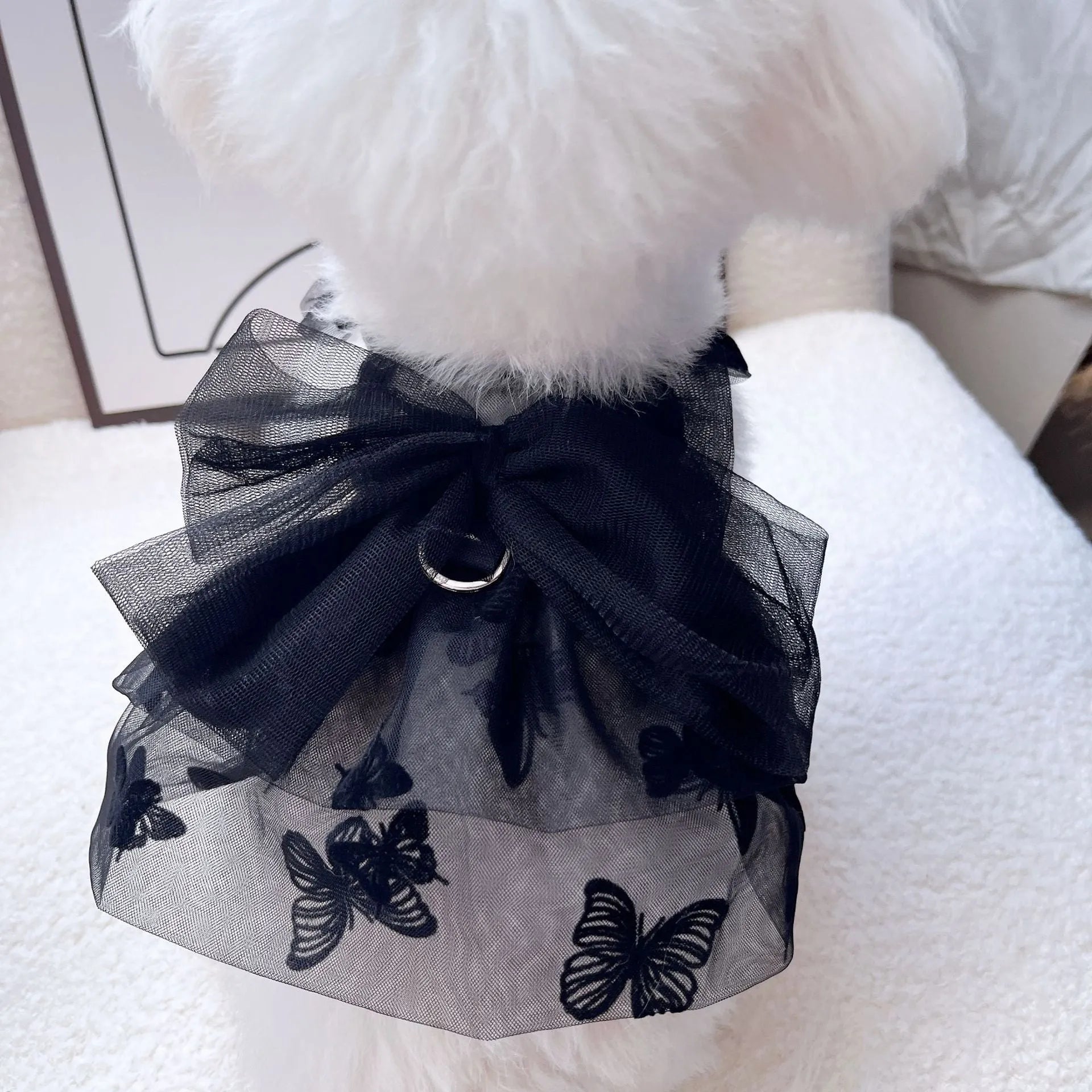Black gauze princess tulle skirt for a small dog or cat on a mannequin, showing the layered design.
