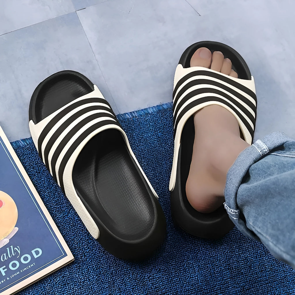 Casual PVC upper and EVA sole slippers in beige, shown on a plain background.