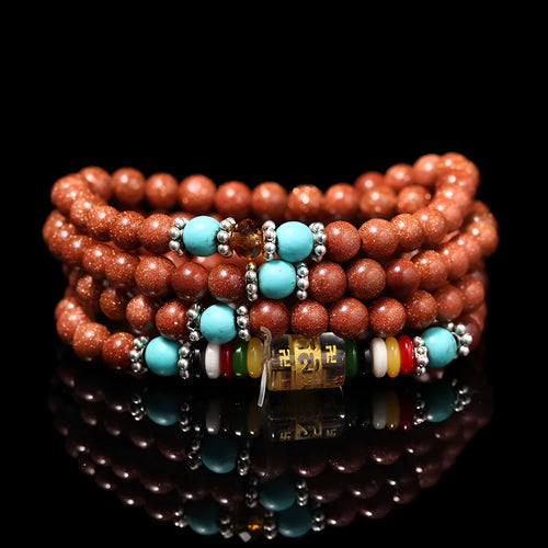 Golden star stone colour bracelet with 108 nugget sand pieces and six words mantra design