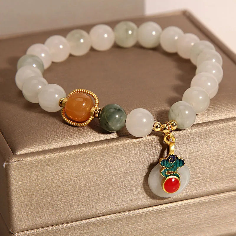 Women's ice jade crystal bracelet with Xiangyun peace buckle and pearl accents