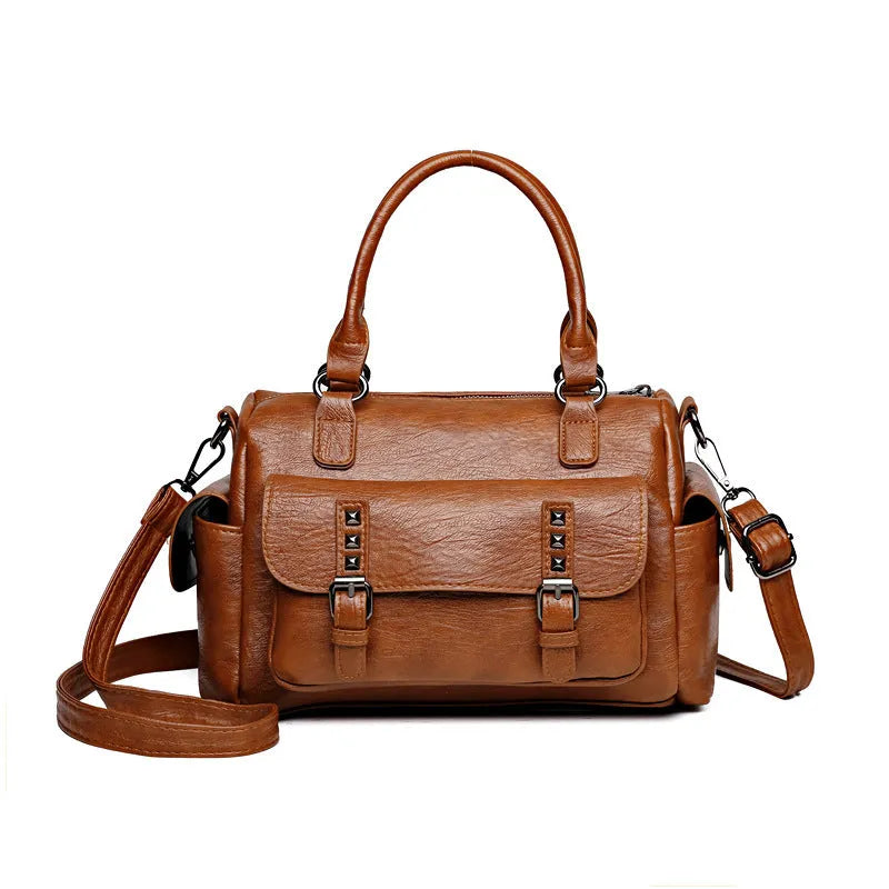 Vintage messenger bag in horizontal square shape with contrast stitching, shown in available colours