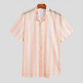 Pink loose-fit men's cardigan shirt with waffle texture fabric on a hanger.