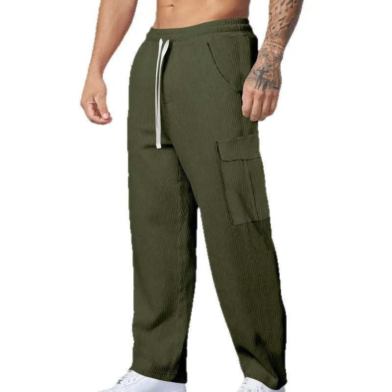 Men's loose-fitting corduroy cargo trousers in a straight-leg design with a drawstring waist.