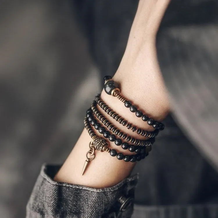 Black geometric multi-layered beaded bracelet with colourful retro beads and adjustable fit