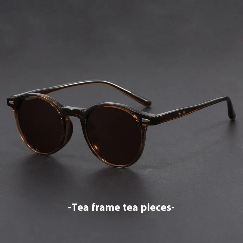 Retro oval frame sunglasses with polarised grey lenses in sand black, bright black, green, grey or dry tea frame colours