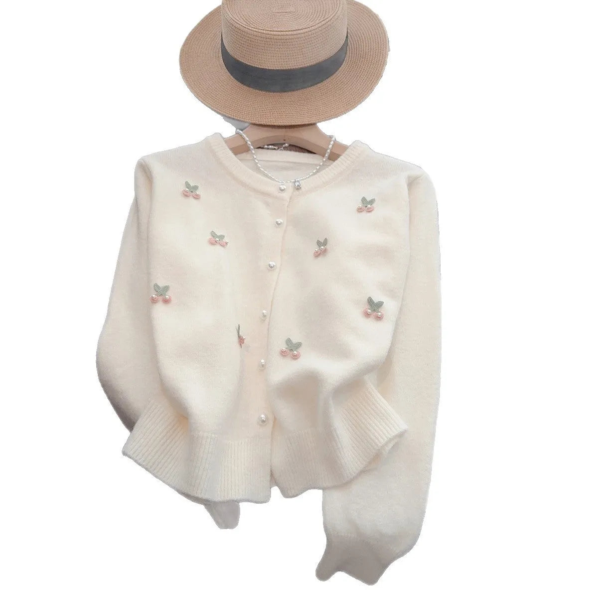 Slim fit cashmere cardigan with beaded detailing in pink, shown open as a layer.