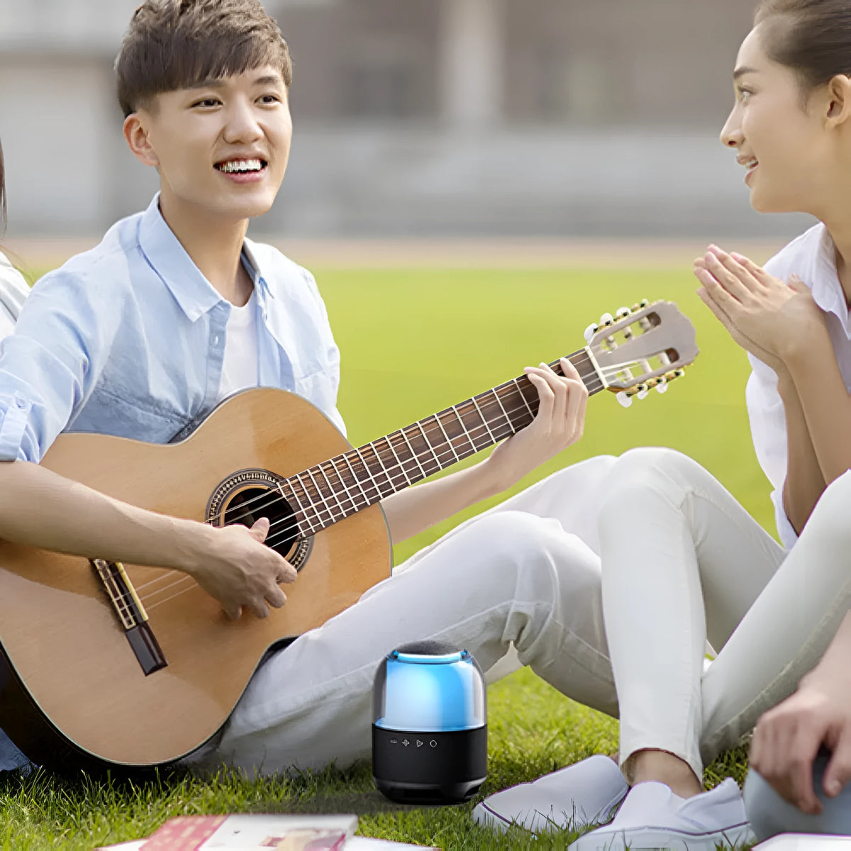 Portable Bluetooth speaker with memory card slot and built-in 2000 mAh battery in colourful version colours