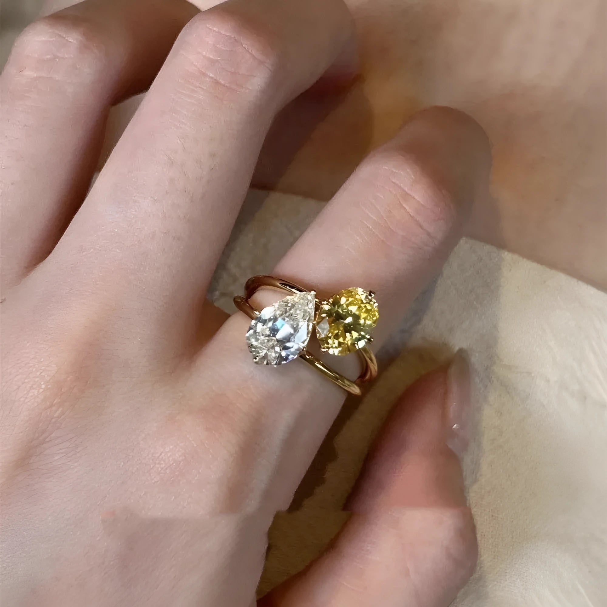 Geometric copper open ring with water drop stone and zircon details