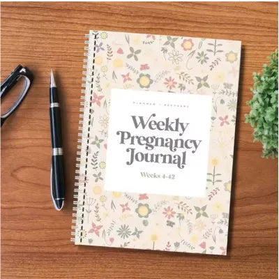 A5 weekly pregnancy diary notebook open to weekly tracking pages