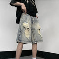 Blue retro-style denim shorts with a wide-leg, loose fit on a person.