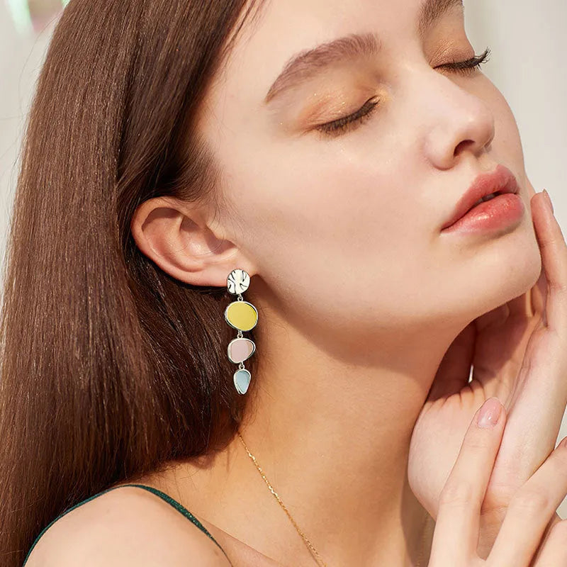 Morandi three-colour oil-dripping disc earrings with sterling silver needle on white background