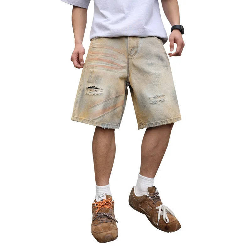 Men's light blue ripped denim shorts with straight leg style and mid-waist fit